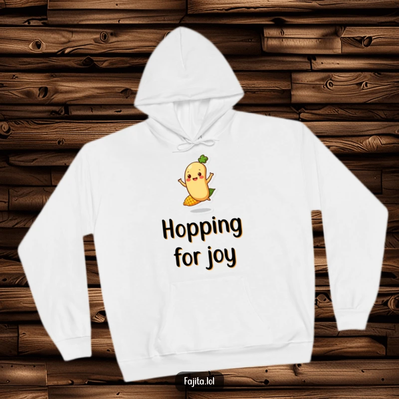Funny Fajita Bean Character Hoodie featuring a happy bounce on a corn kernel, offering warmth and humorous delight.